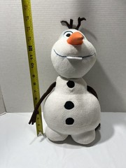 Collection of 18 various stuffed animals and characters.