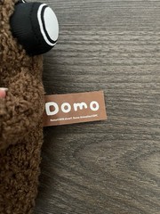 Domo Brown Plush Stuffed Animal Surface