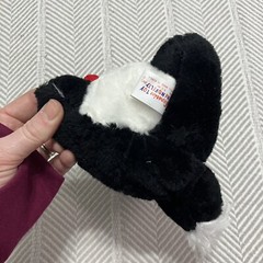 Superior Toy Co Hard Plush Skunk with Flower Carnival Toy Black and White