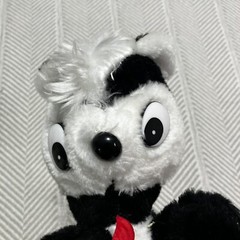 Superior Toy Co Hard Plush Skunk with Flower Carnival Toy Black and White
