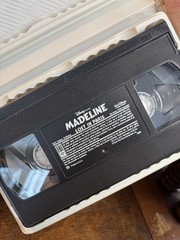 1990 Madeline Doll, 1987 Madeline Pop Up Book, and VHS of Madeline Lost In Paris