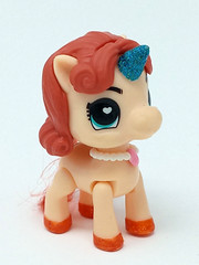 Zuru Unicorn 2.5″ t 5 Surprise Tan & Orange w/ blue glitter horn