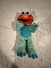 Sesame Street Dino Stomp Elmo 13-Inch Plush Stuffed Animal Sings and Dances