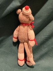 6” Homemade sock monkey with toboggan and buttons on arms