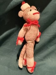 6” Homemade sock monkey with toboggan and buttons on arms