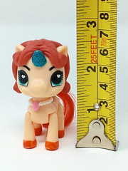 Zuru Unicorn 2.5″ t 5 Surprise Tan & Orange w/ blue glitter horn