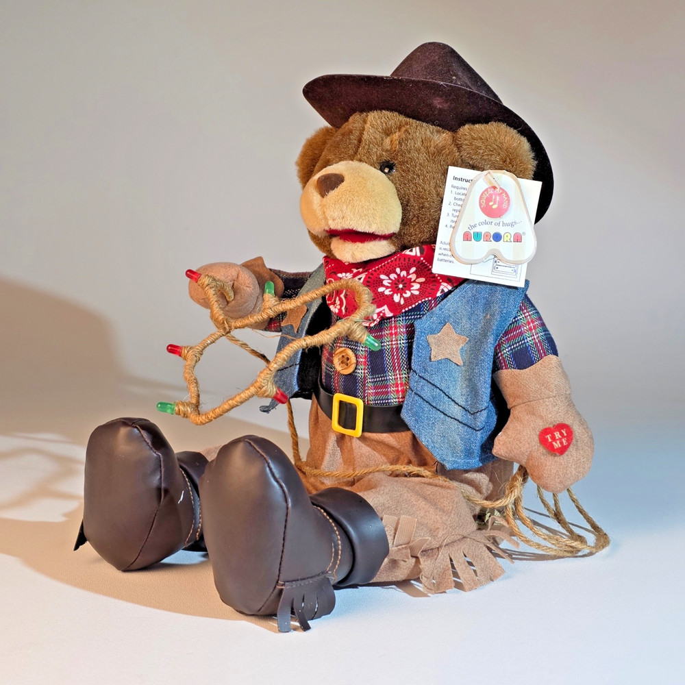 Vtg. Aurora Singing Dancing Cowboy Bear Plush Lasso Lights Up Sings – see video