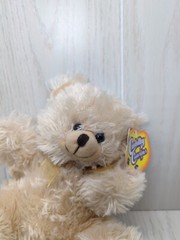 Greenbrier International Cuddly Cousins tan beige teddy bear sitting Dollar Tree