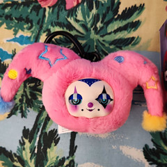 DOKESH! Vinyl Face Surprise Clip-On Mini Plush Jester Pink Yellow Blue
