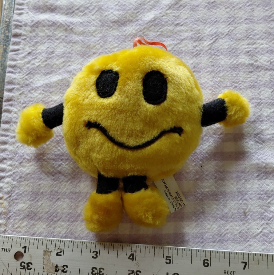 vintage Plush Smiley toy with legs and arms yellow emoji