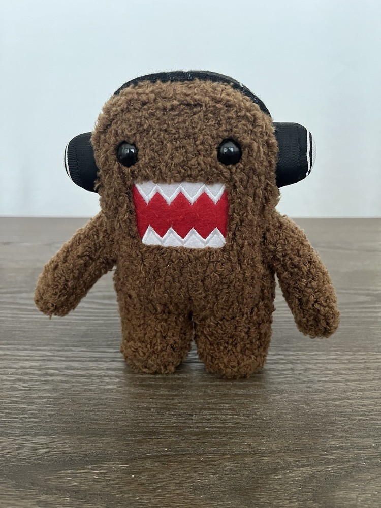 Domo Brown Plush Stuffed Animal Surface