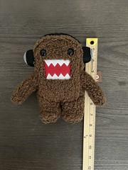 Domo Brown Plush Stuffed Animal Surface