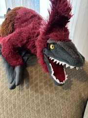 Jurassic World Pyroraptor Universal Studios, Does not work. Plush robot dinosaur