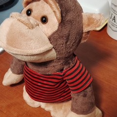 2009 Gemmy side stepping Monkey Brown/Beige Red & Black Striped Shirt
