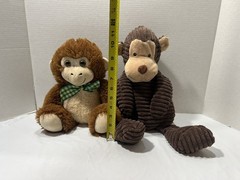Collection of 18 various stuffed animals and characters.